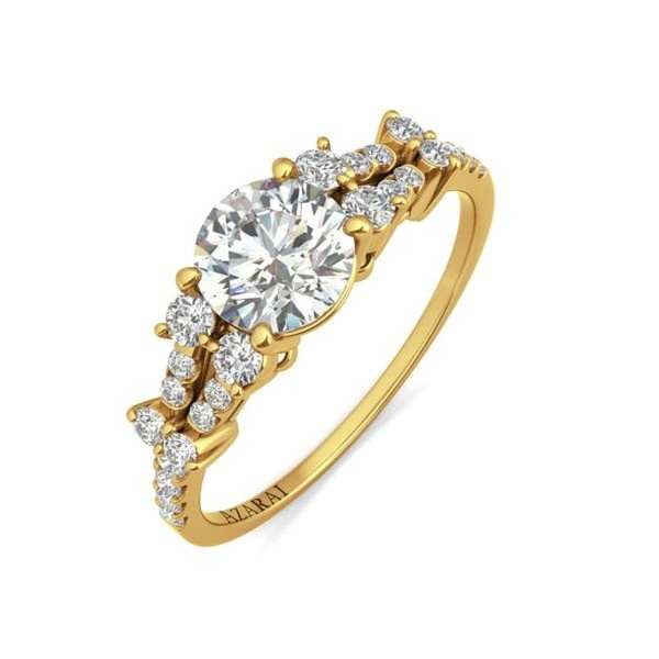 An elegant diamond engagement ring in yellow gold.