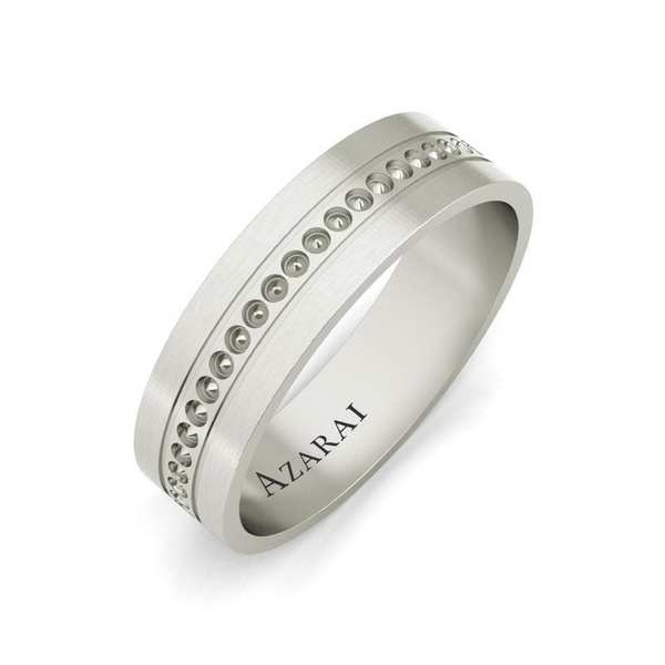 A white gold wedding band with diamonds.