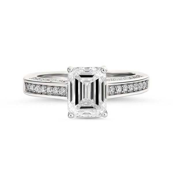 An emerald cut diamond engagement ring.
