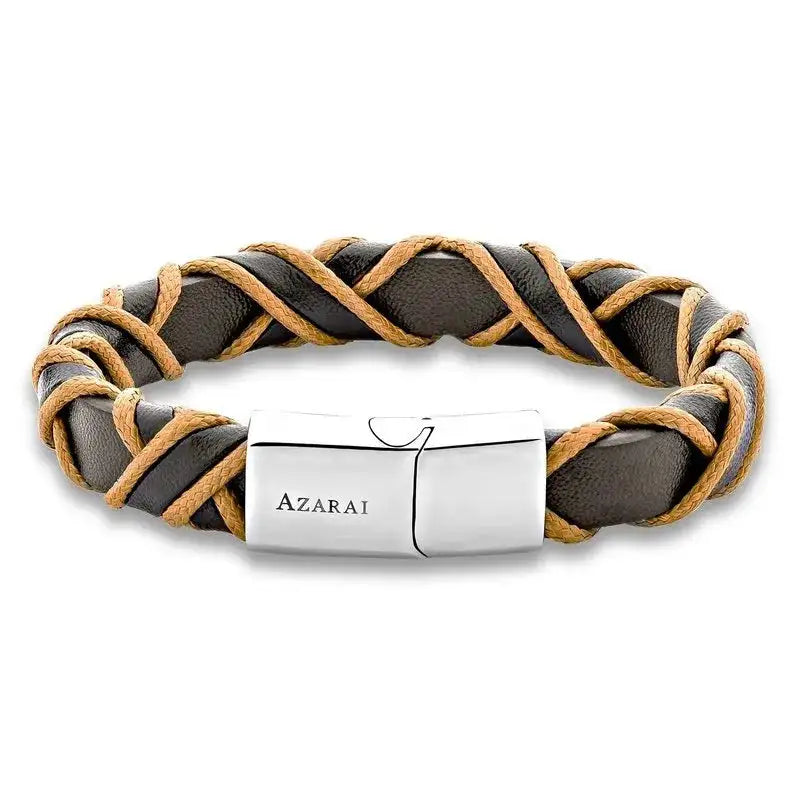 A braided bracelet with tan leather cords woven around a dark band, featuring a silver clasp engraved with "AZARAI.
