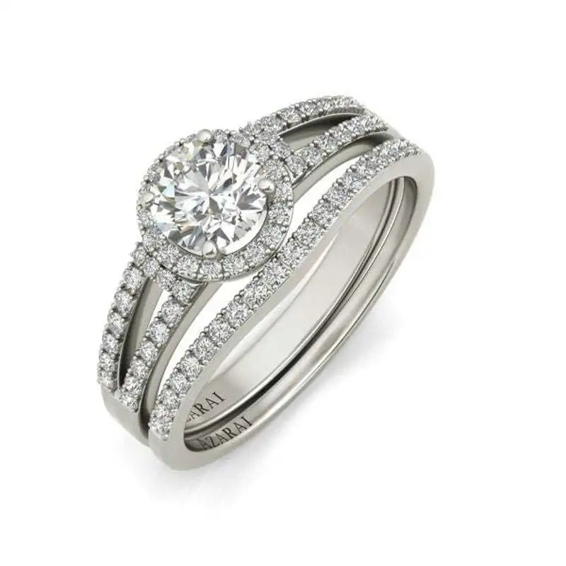 A white gold ring with a round-cut center diamond and smaller diamonds set along the band; "AZARAI" engraved inside.