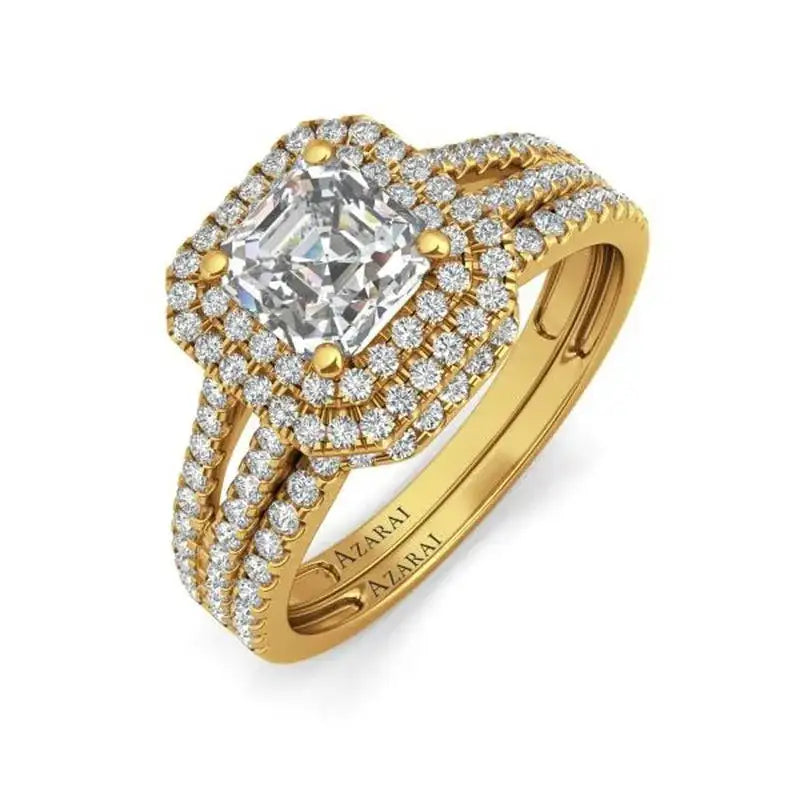 A yellow gold engagement ring set with an asscher cut diamond.