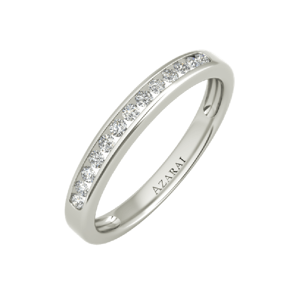 A white gold wedding band with channel set diamonds.