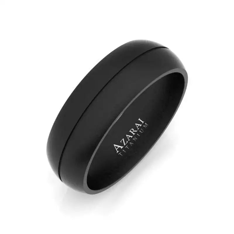 Matte black titanium ring with a slightly domed profile and "Azarai Titanium" engraved on the inner band, displayed on a white background.