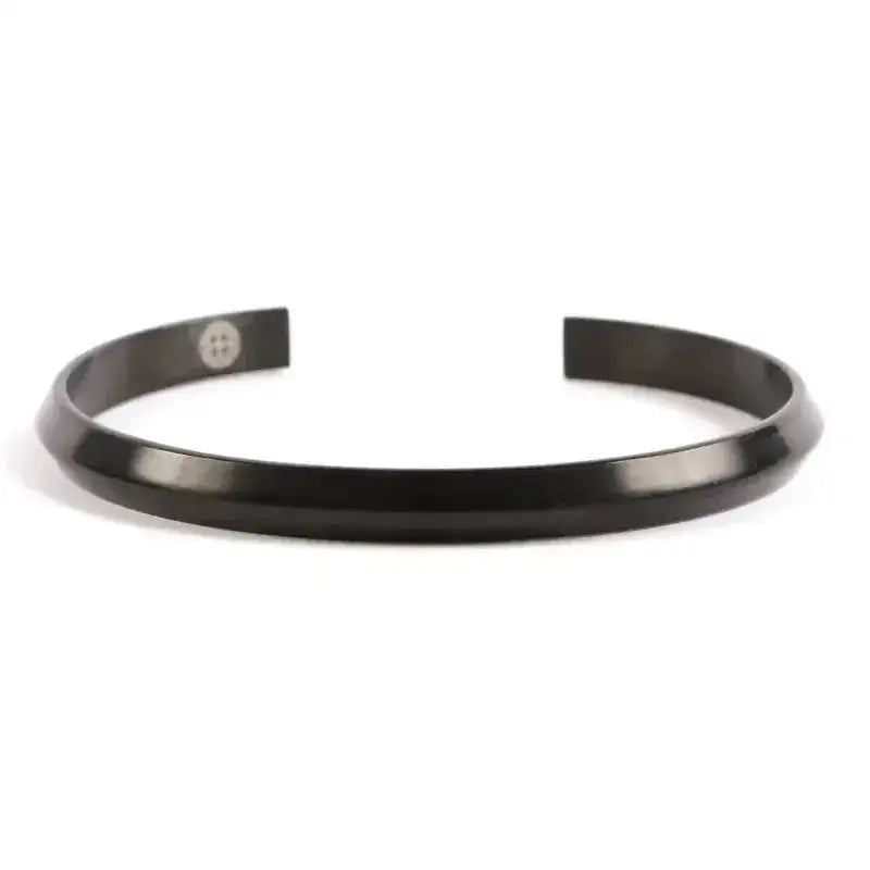 A black, open-ended metal cuff bracelet with a smooth, slightly curved design, displayed on a white background.