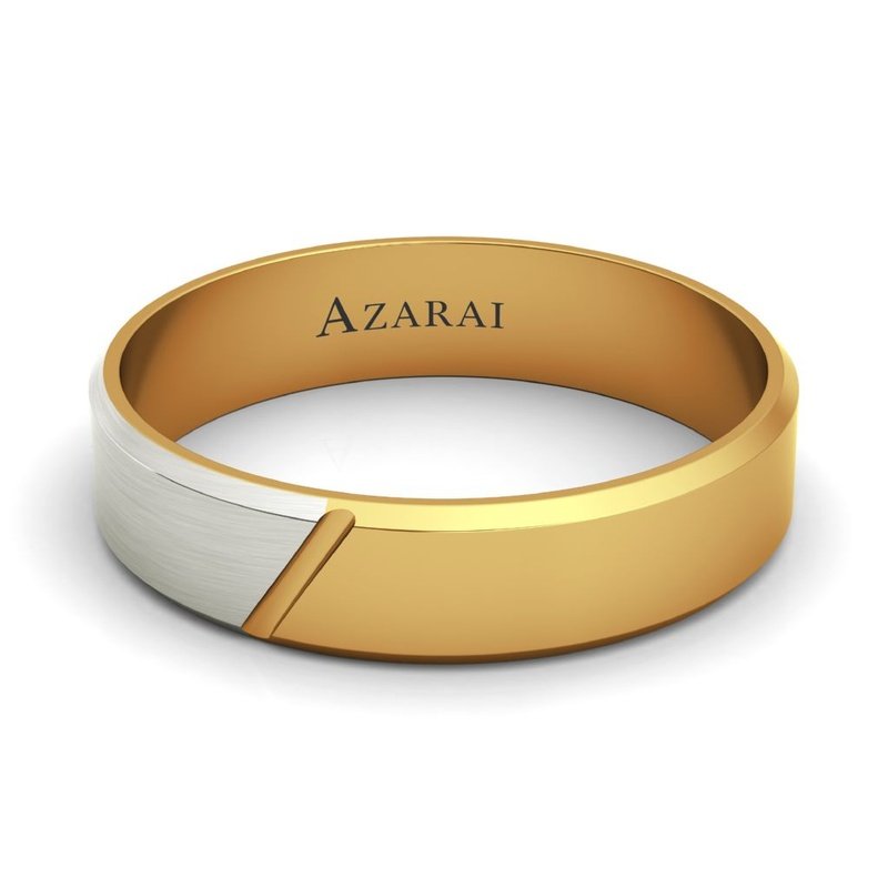 An Eclipse 14kt gold wedding band made with the word azarai engraved on it.