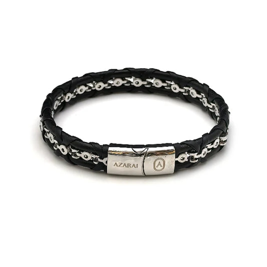 The Entwine Leather Chain Men's Bracelet features black braided leather, a stainless steel anchor chain detail, and a metallic clasp engraved with the AZARAI name and logo.