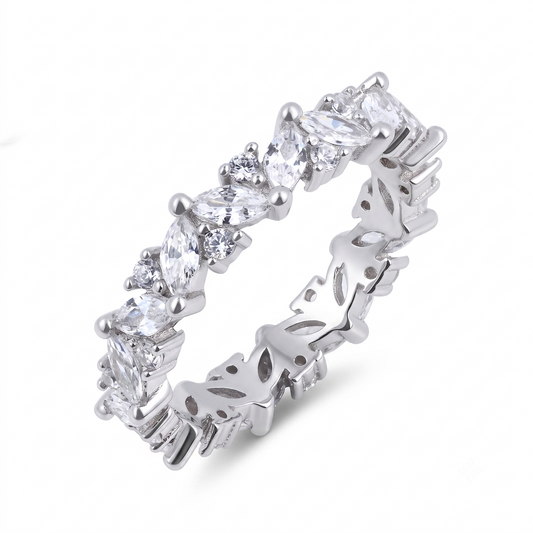 The Gipsy sterling silver wedding band features alternating marquise and round clear gemstones on a silver band, with a delicate cutout butterfly pattern along the inner side.