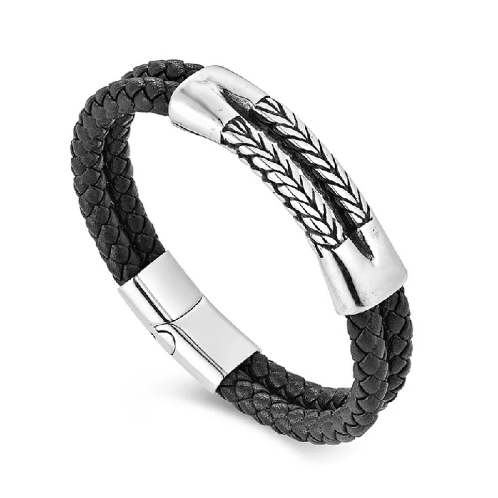 The Harvest Braided Leather Men's Bracelet features black braided leather, a silver clasp, and a stainless steel centerpiece with a woven pattern.