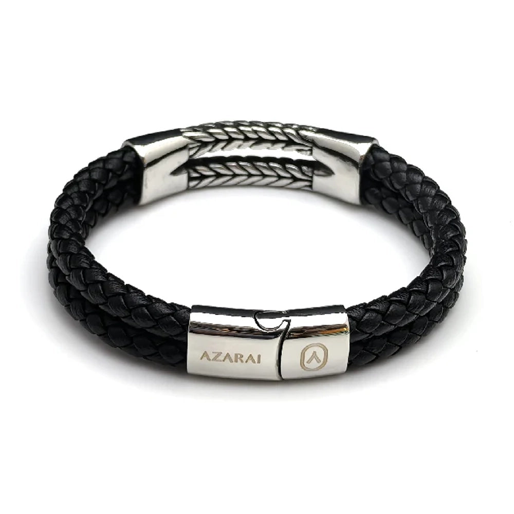 The Harvest Braided Leather Men's Bracelet features black braided leather with a stainless steel centerpiece, silver accents, and "AZARAI" engraved on the clasp—combining timeless style with agricultural heritage.