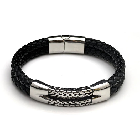 The Harvest Braided Leather Men's Bracelet features black braided leather, a stainless steel centerpiece, and silver feather-shaped accents, blending timeless style with a subtle tribute to agricultural heritage.