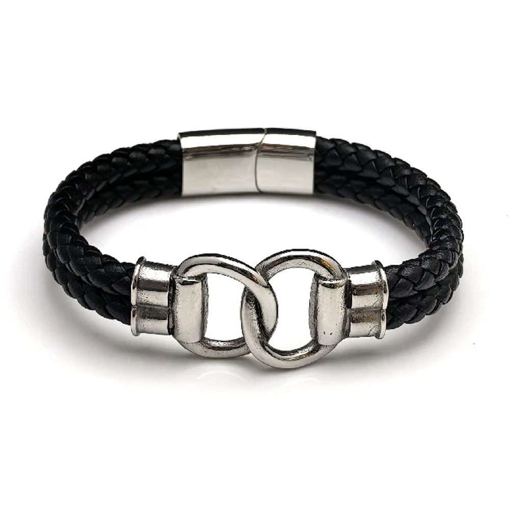 The Hinge Braided Leather Men's Bracelet features black braided leather, a stainless steel infinity link, interlocking clasp, and a metallic magnetic closure.