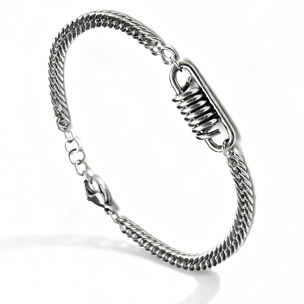The Ignition Stainless Steel Men's Bracelet features a silver Franco chain, lobster clasp, and unique coiled spring detail at the center, shown on a white background for an automotive-inspired style.