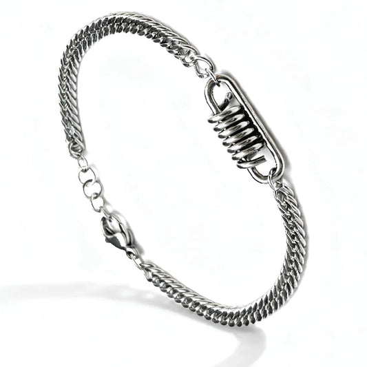 The Ignition Stainless Steel Men's Bracelet features a silver Franco chain, lobster clasp, and unique coiled spring detail at the center, shown on a white background for an automotive-inspired style.