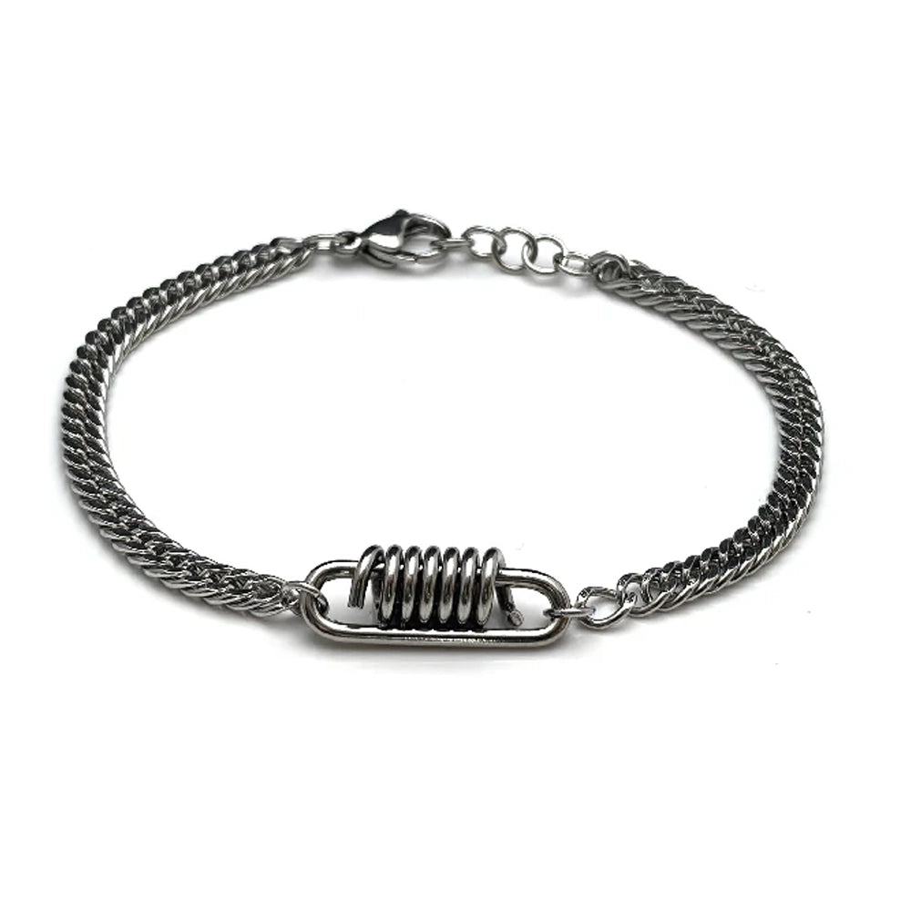 The Ignition Stainless Steel Men's Bracelet features a central metal coil detail and lobster clasp, blending automotive-inspired style with a modern twist on the classic Franco chain design.