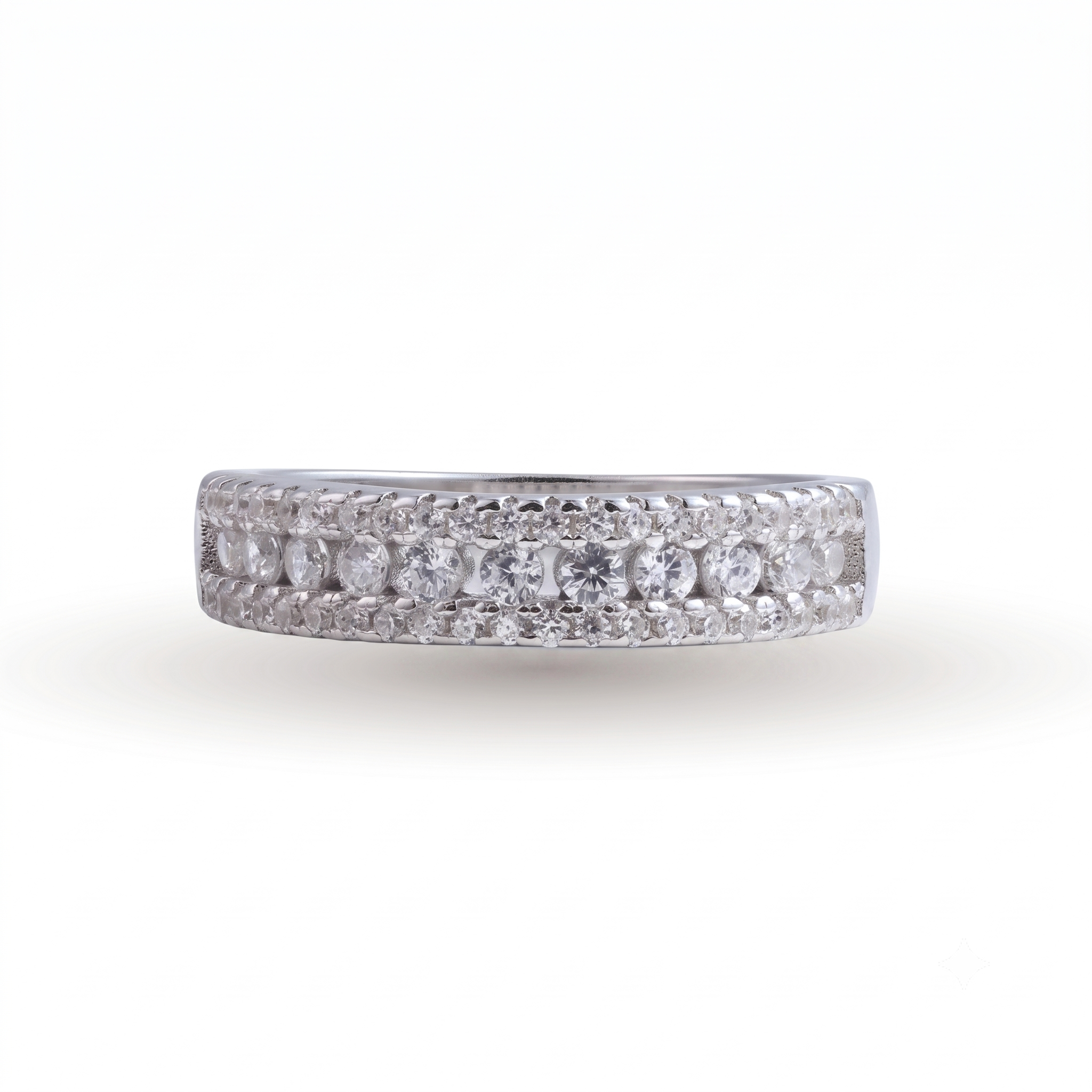 The Kayla sterling silver wedding band is showcased against a white background, featuring three rows of round white diamonds set in a pave setting.
