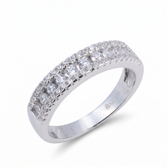 The Kayla sterling silver wedding band is beautifully designed with three rows of small round clear gemstones set elegantly along the top half, shown on a white background.