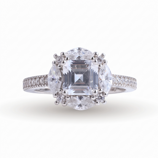 Mulan sterling silver engagement ring featuring a square-cut center diamond, two oval side diamonds, and smaller diamonds set along the band, showcased on a white background—perfect for a modern Mulan seeking elegance beyond tradition.