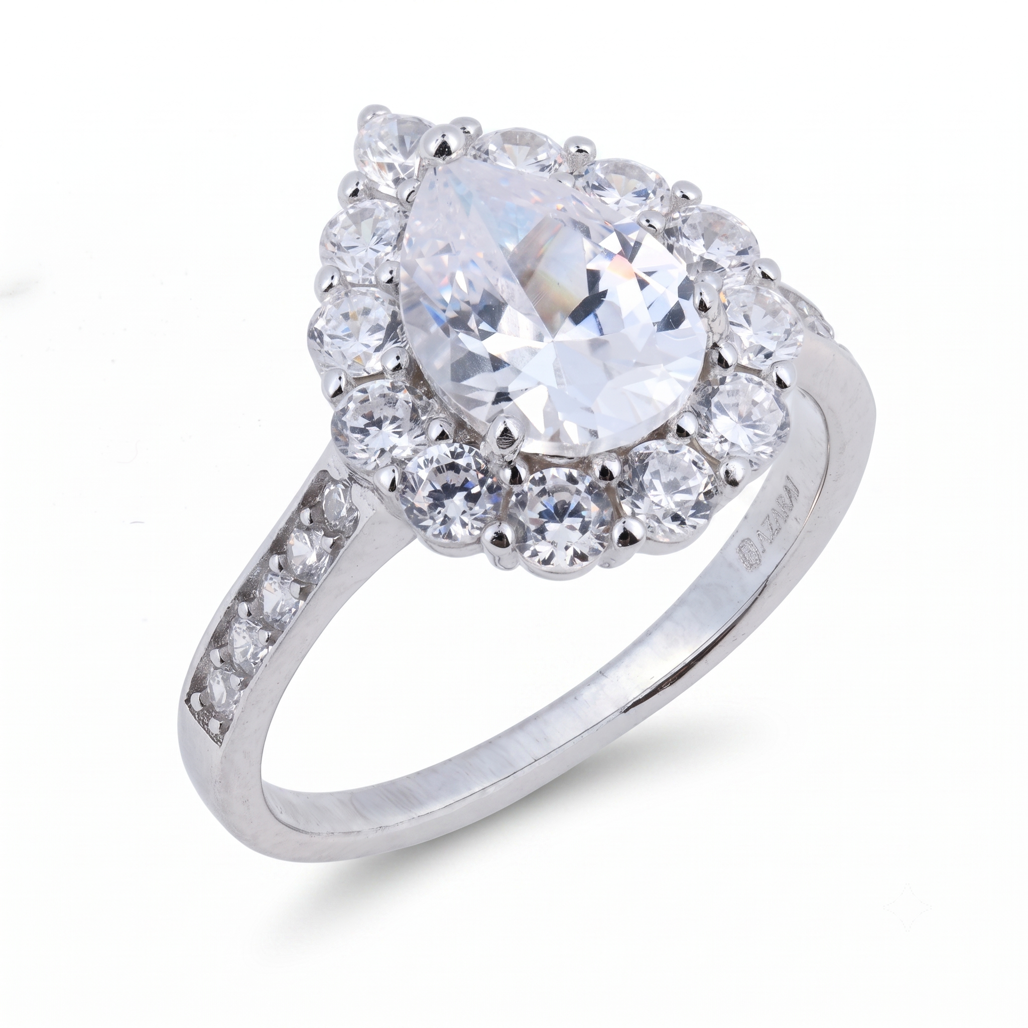 Certainly! Here’s the rewritten sentence using the given product data: The Oriana sterling silver engagement ring showcases a pear-shaped central gemstone encircled by round clear stones and accented with smaller stones set gracefully along the band.