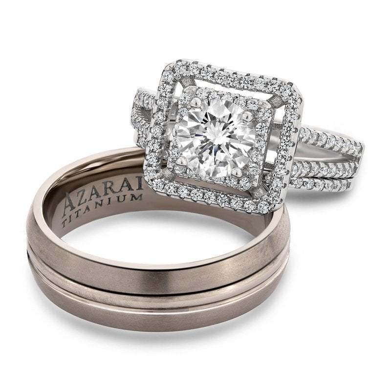 A Giordan sterling silver and titanium trio set engagement ring and wedding band set.