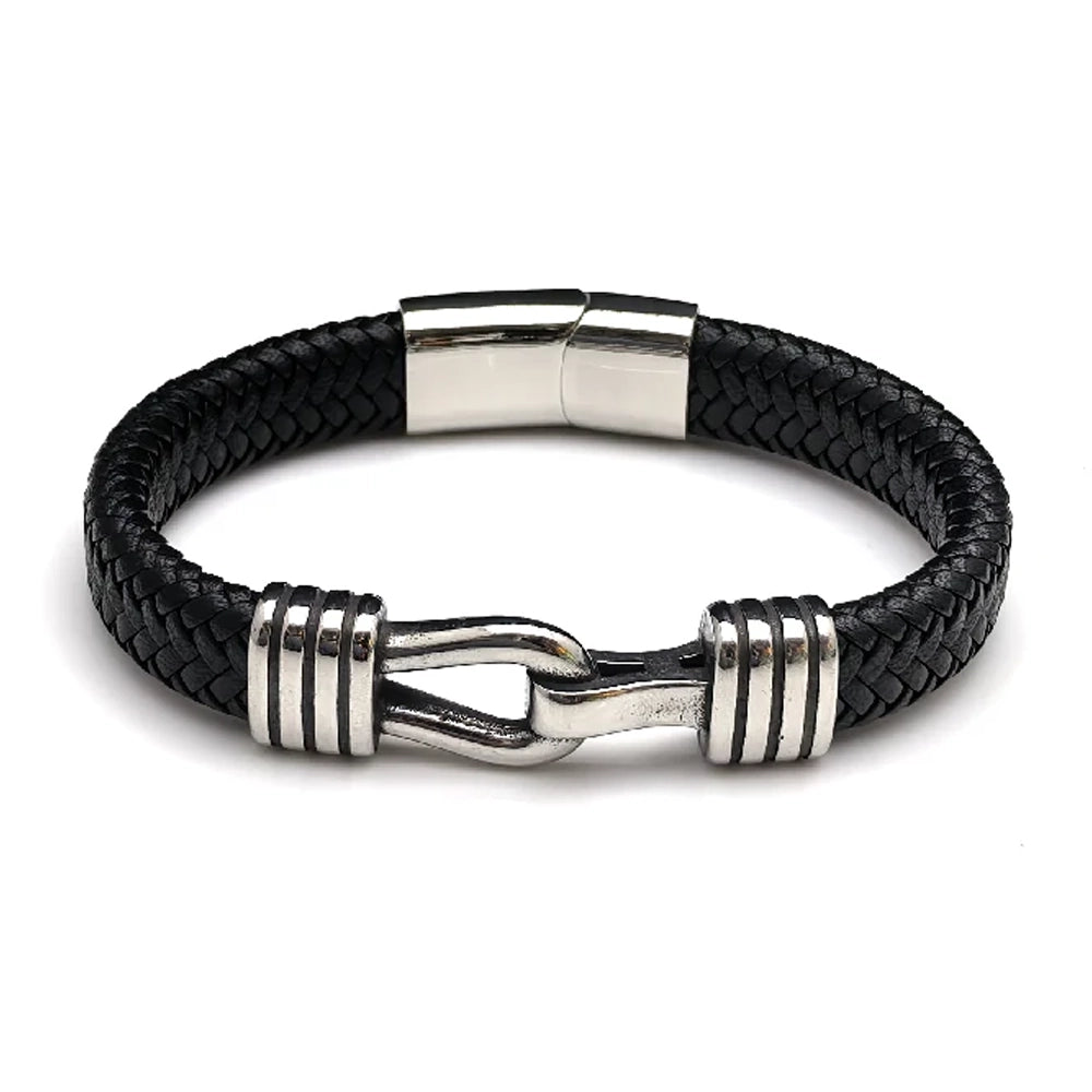 The Stirrup Braided Leather Men's Bracelet features black braided leather, a stainless steel clasp, and silver accents—ideal for fans of equestrian-style jewelry.
