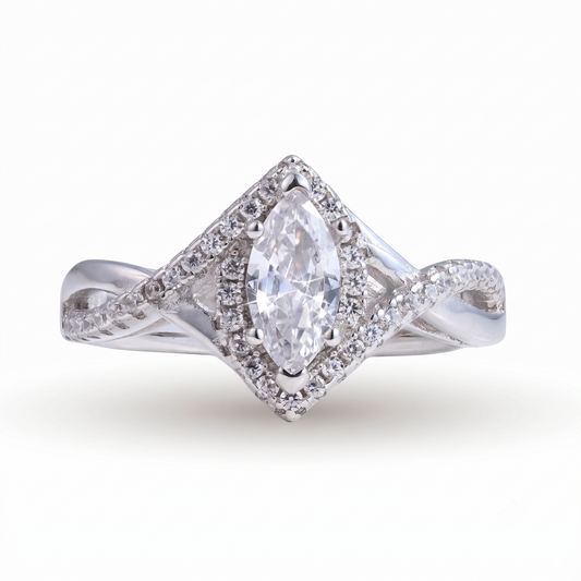 A graceful Sia Marquise engagement ring crafted in sterling silver, featuring a stunning marquise-cut center stone surrounded by small round stones in a twisted band design.