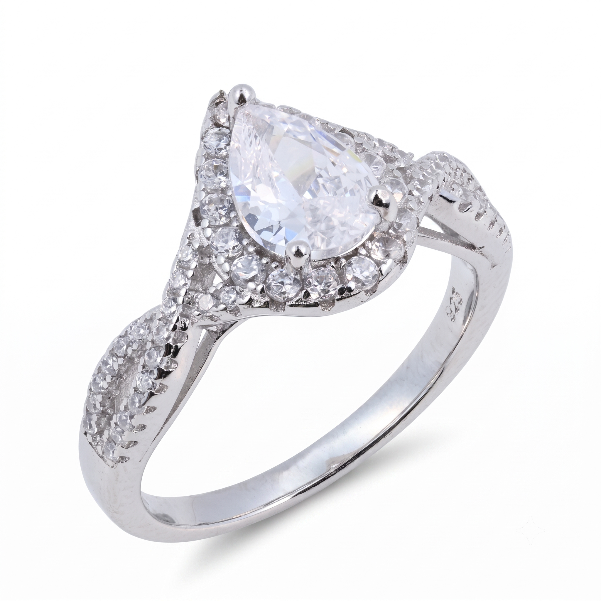 The Sia Pear sterling silver engagement ring features a brilliant pear-shaped clear gemstone at its center, complemented by smaller round stones elegantly set along the band.
