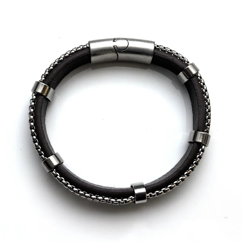 The Vex Leather Chain Men's Bracelet features a black leather cord with stainless steel box chain detailing and a magnetic clasp, displayed flat in a circular shape on a white background.
