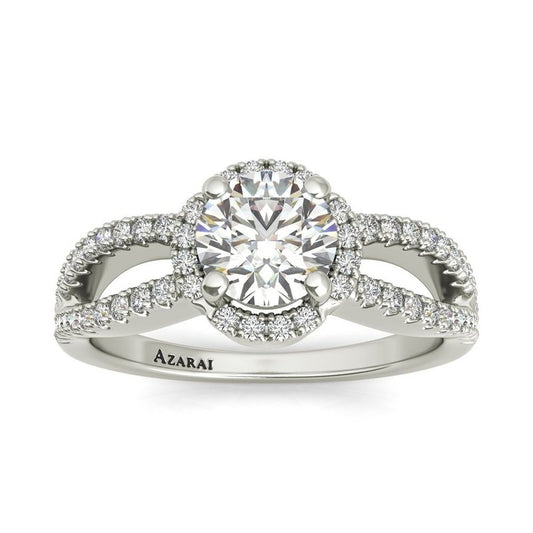 A white gold Angelika sterling silver engagement ring with a halo and diamonds, perfect for an Angelika.