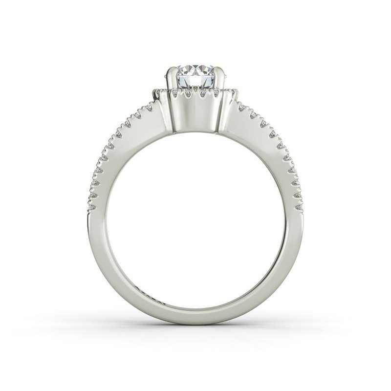 A Angelika sterling silver engagement ring with a round diamond in the center.