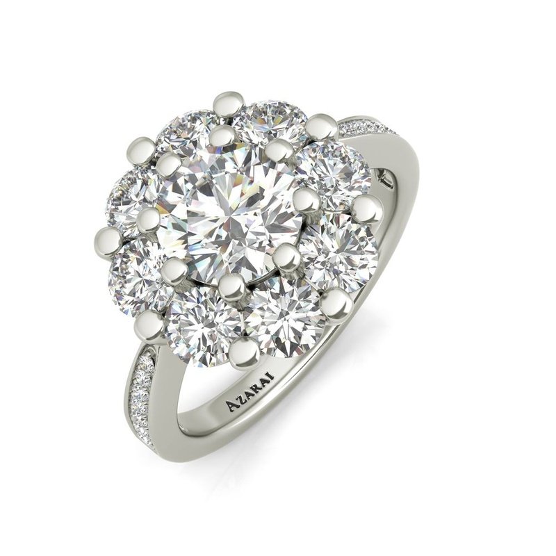 Charlotte sterling silver engagement ring, made of sterling silver, features a dazzling cluster of diamonds.