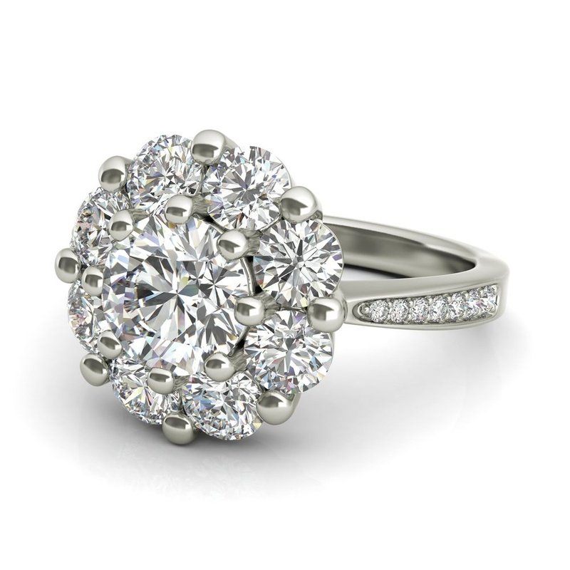 A Charlotte sterling silver engagement ring in white gold.