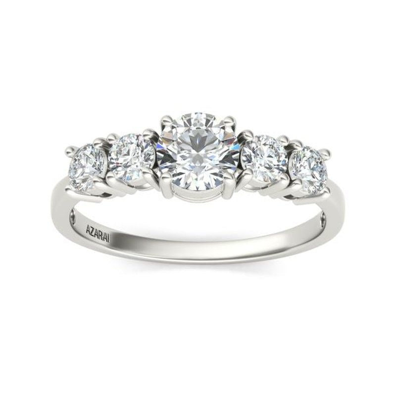 A five stone diamond engagement ring in circa 9kt gold.