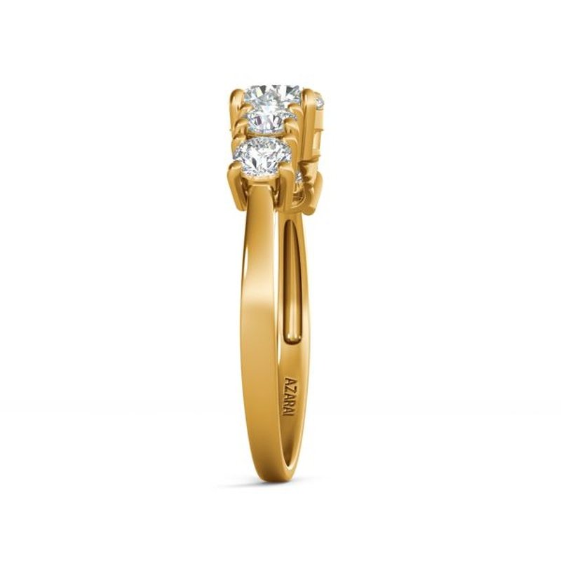 A Circa 9kt gold diamond engagement ring with three stones.