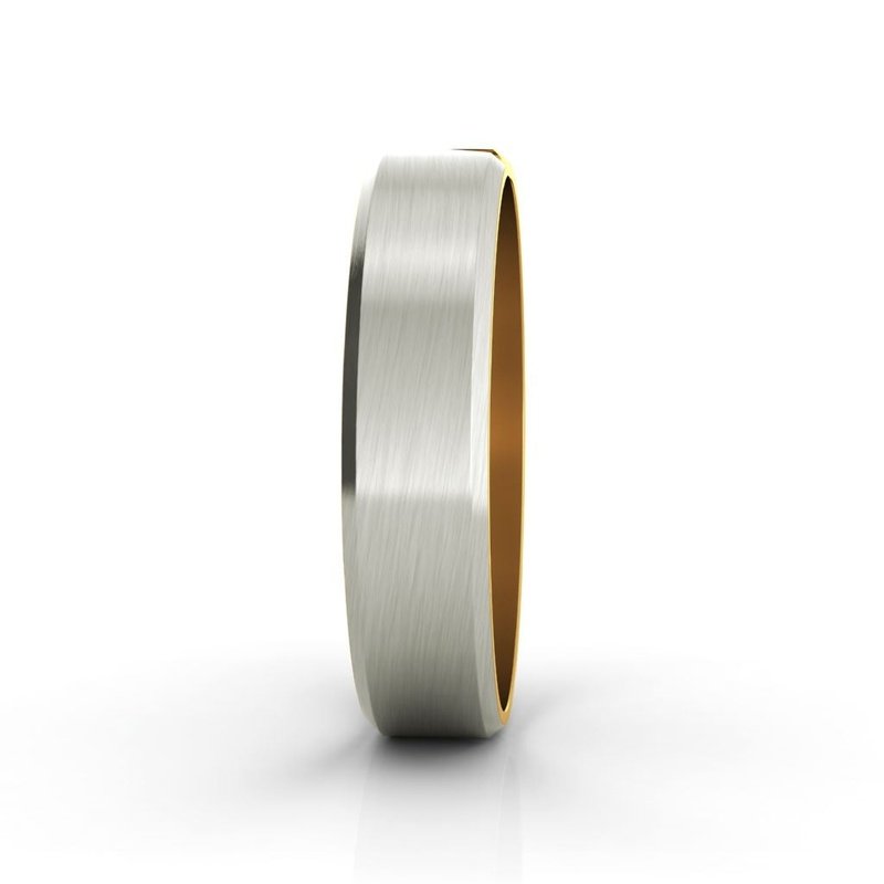 An Eclipse 14kt gold wedding band featuring a gold and silver ring.