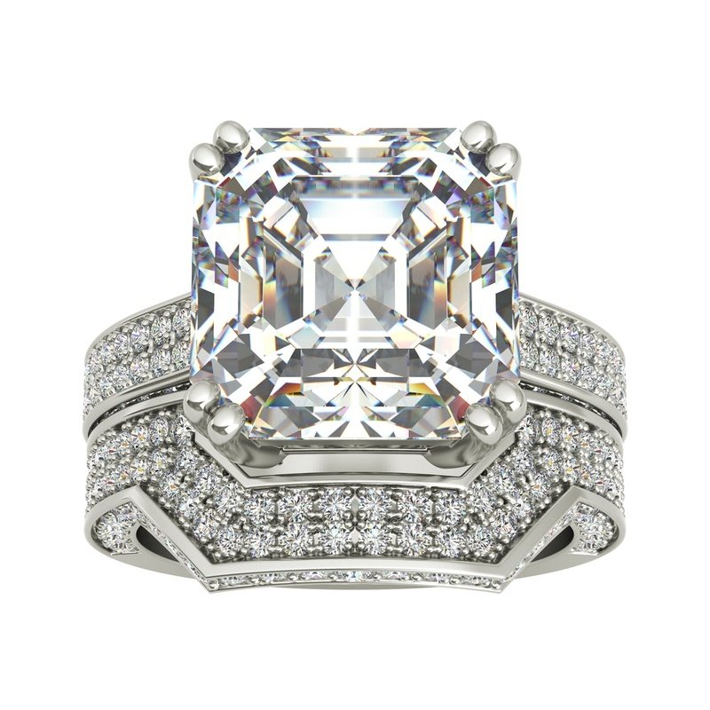 Magna 9kt gold bridal set featuring a large square-cut central diamond flanked by pave diamonds on its band.
