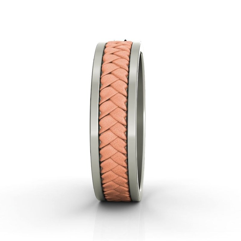 A Montclair 14kt gold wedding band with a braided pattern.