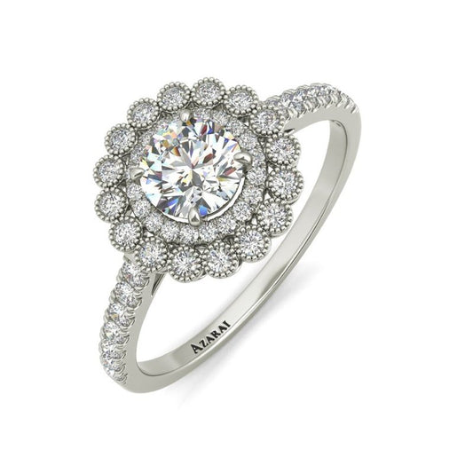 The Portia 14kt gold engagement ring features a stunning diamond halo.