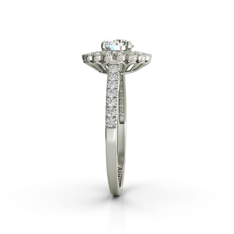 A Portia 14kt gold halo engagement ring with diamonds.