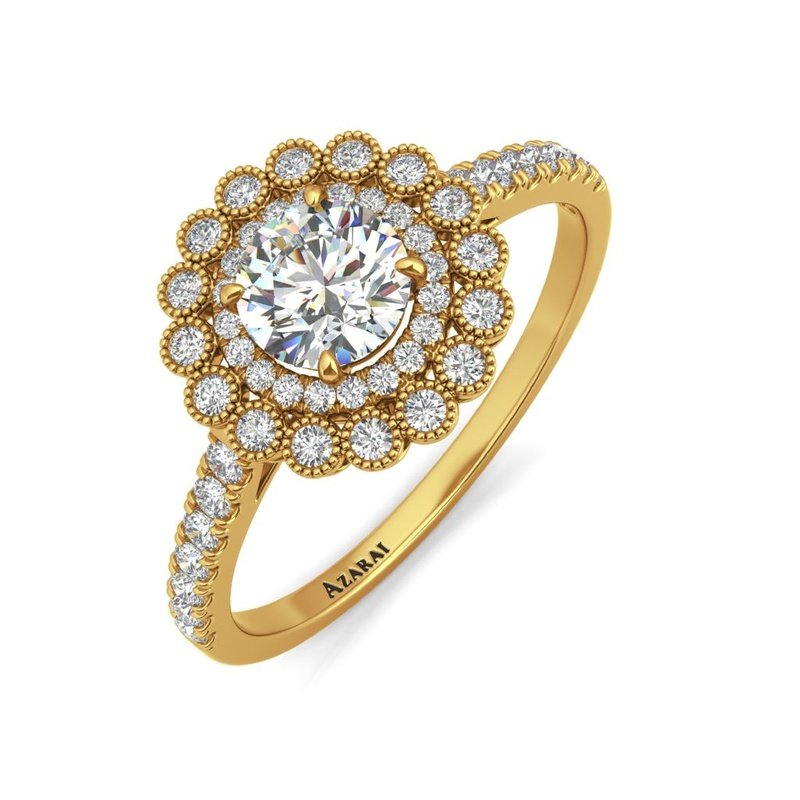 The Portia 14kt gold engagement ring features a cluster of diamonds set in beautiful yellow gold.