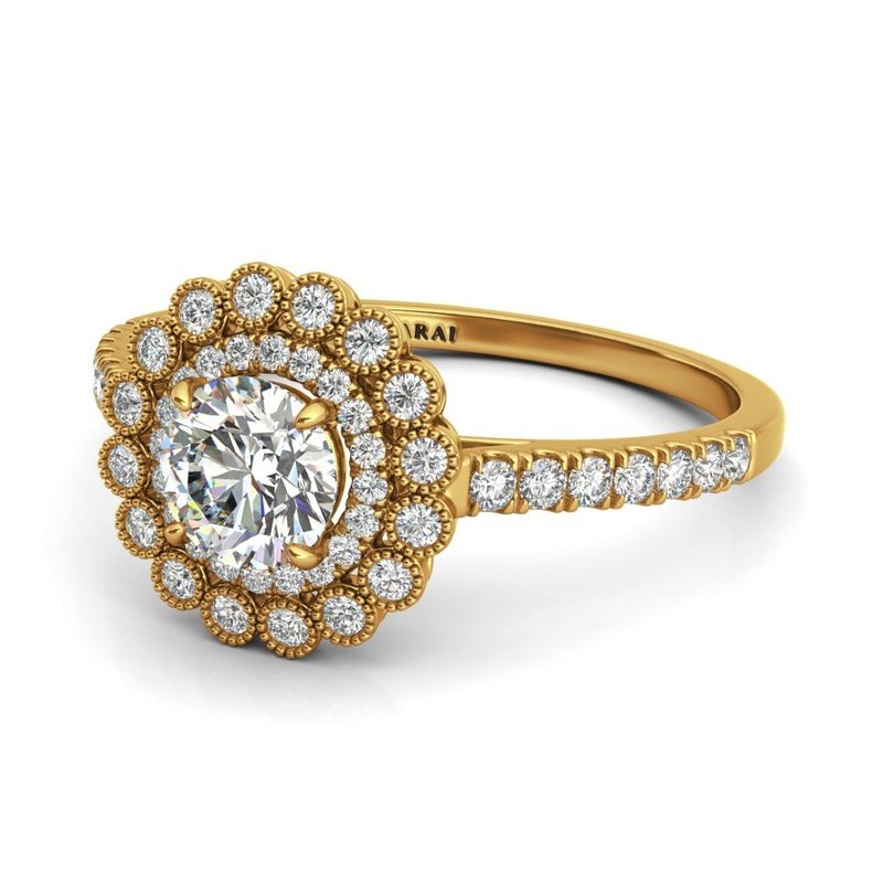 The Portia 14kt gold engagement ring showcases an elegant diamond halo in 14kt yellow gold.