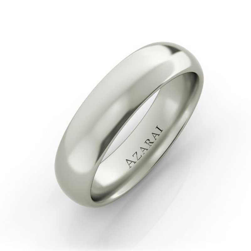 A Solis 14kt gold wedding band 5mm with the word "azarai" engraved on the inner band, isolated on a white background.