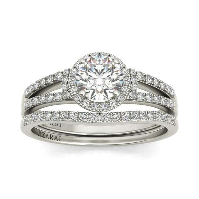A Tempest and Mitchell sterling silver trio engagement ring set.