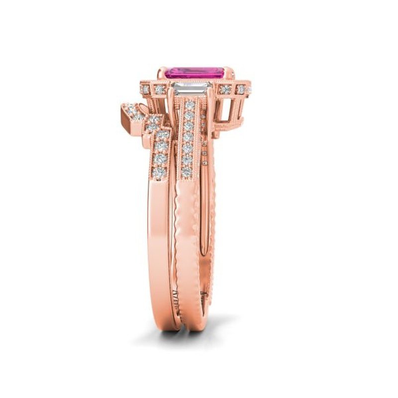 Tiffany 9kt gold bridal set with a prominent pink gemstone, surrounded by smaller diamonds and intricate details on the band.
